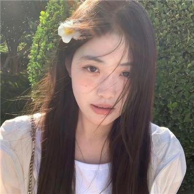 桃花含露又春风